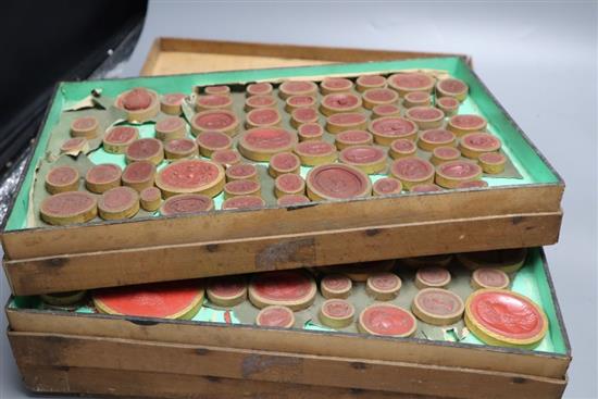 Three trays of 19th century Italian Grand Tour plaster cameos and intaglios